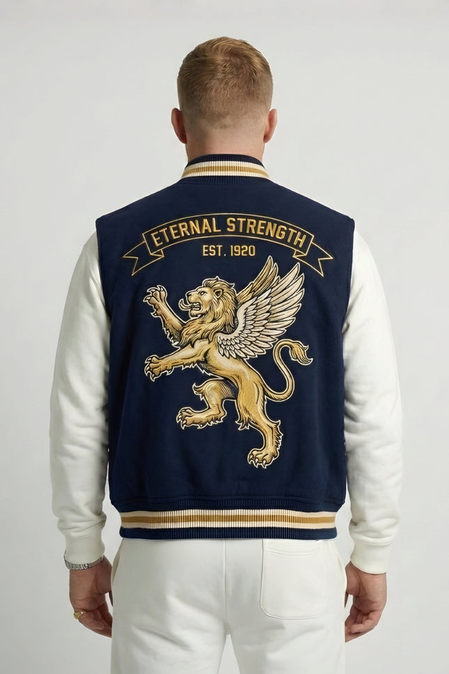 Man wearing a navy blue letterman jacket with gold lion emblem and 'Eternal Strength' text on the back.