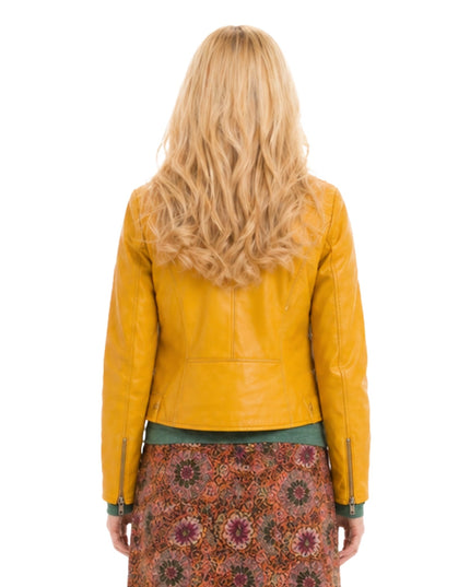 Person wearing a mustard yellow leather jacket on a white background