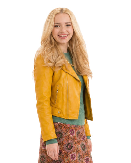 Woman wearing a yellow leather jacket on a white background