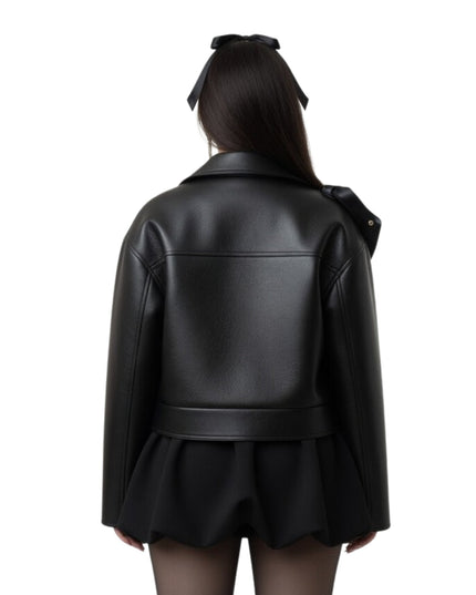 Black leather jacket worn by a person on a white background