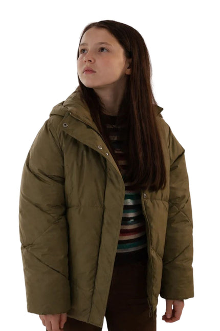 Person wearing a brown puffer jacket on a white background