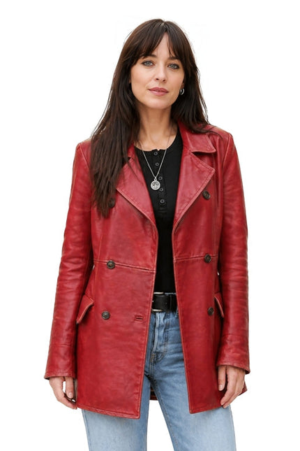 Woman wearing a red leather coat on a white background