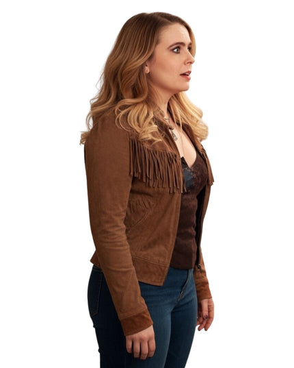 Woman wearing a brown suede jacket with fringe on a white background