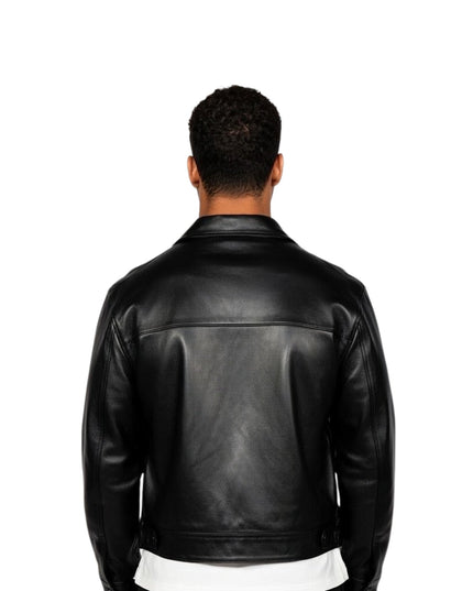 Man wearing a black leather jacket on a white background