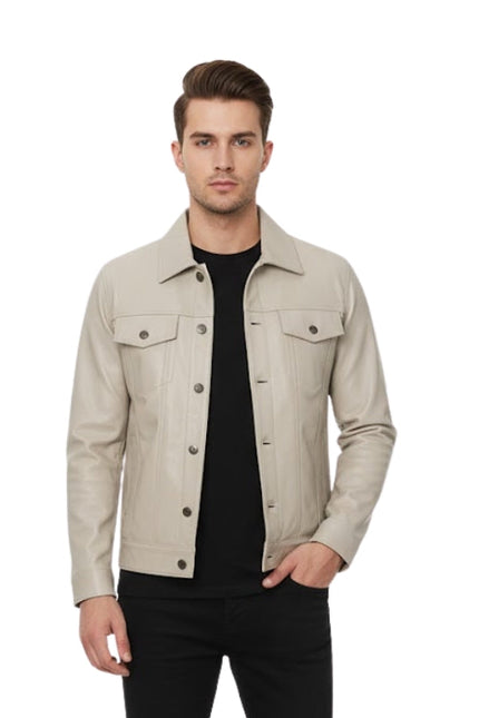 Man wearing a beige jacket over a black shirt on a white background