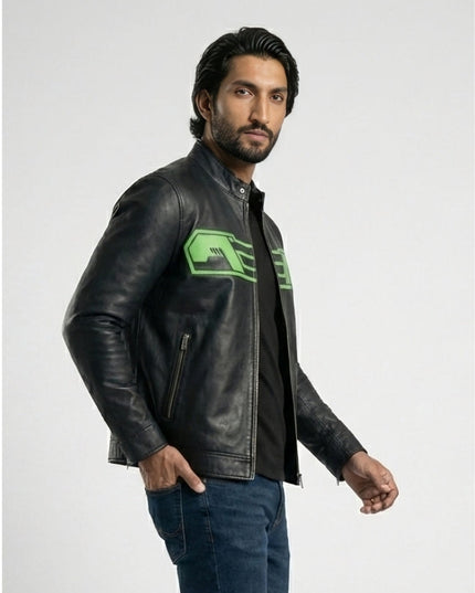 Man wearing a black leather jacket with a green logo on a white background