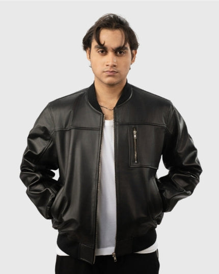 Man wearing a black leather jacket on a white background