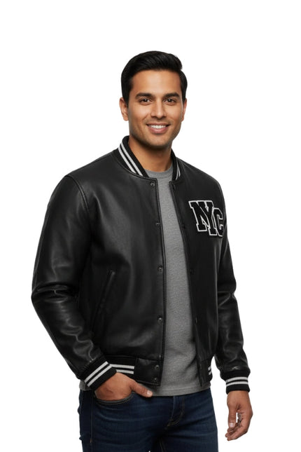 Man wearing a black varsity jacket with 'NYC' on a white background
