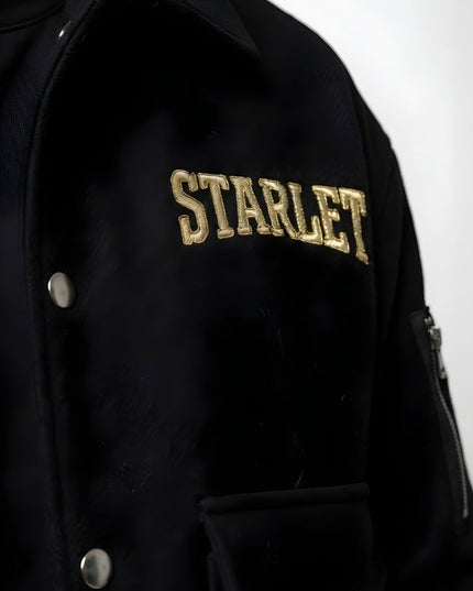 Black jacket with 'STARLET' embroidered on it against a white background