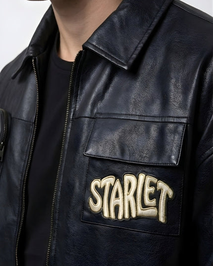 Black leather jacket with 'STARLET' patch on a plain background