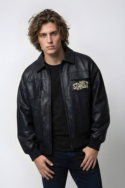 Man wearing a black leather jacket with 'Starlet' branding on a white background