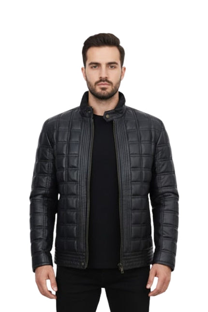 Man wearing a black quilted jacket on a white background