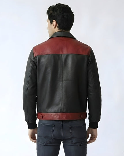 Man wearing a black and red leather jacket on a white background