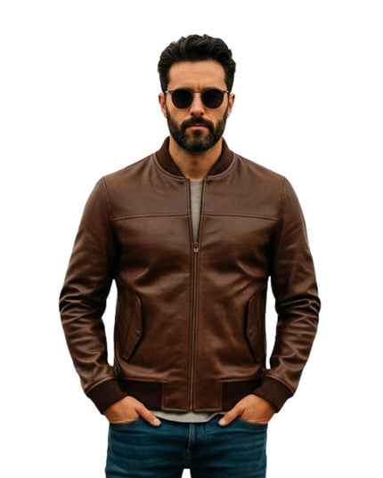 Man wearing a brown leather jacket and sunglasses on a white background
