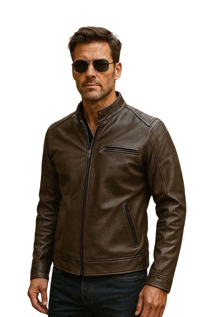 Man wearing a brown leather jacket and sunglasses on a white background