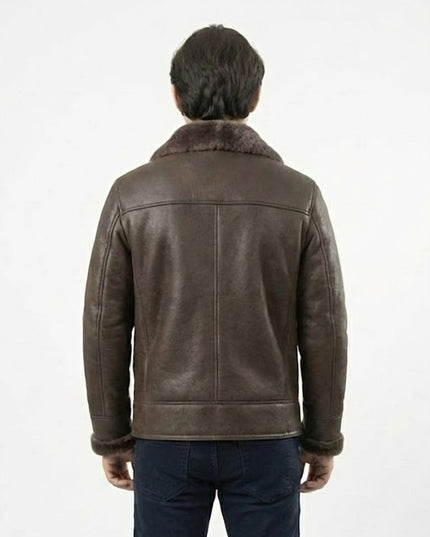 Man wearing a brown leather jacket with fur collar on a white background