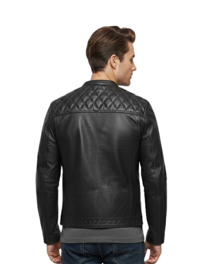 Man wearing a black leather jacket with quilted design on a white background