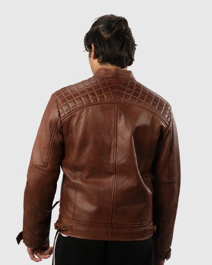 Brown leather jacket with quilted back design on a white background