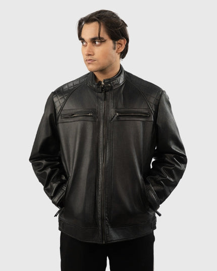 Man wearing a black leather jacket on a white background