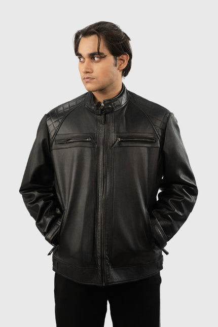 Man wearing a black leather jacket on a white background