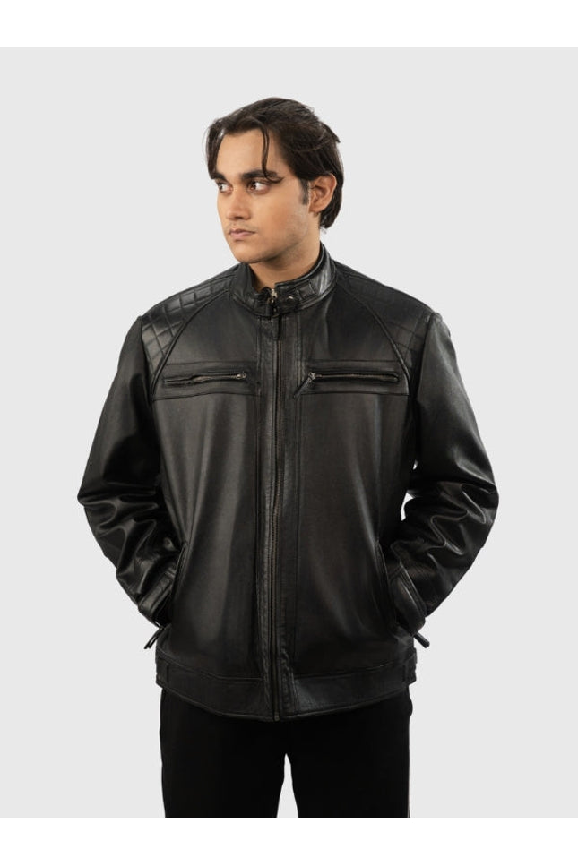 Man wearing a black leather jacket on a white background