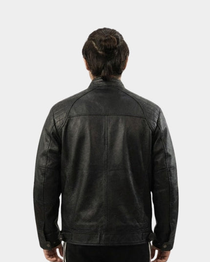 Person wearing a black leather jacket on a white background