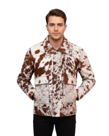 Man wearing a brown and white cow print jacket on a white background