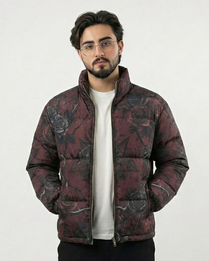 Man wearing a patterned puffer jacket on a white background