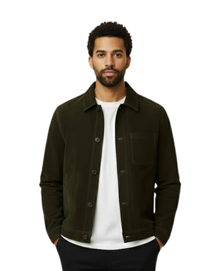 Man wearing a dark green jacket over a white shirt on a white background