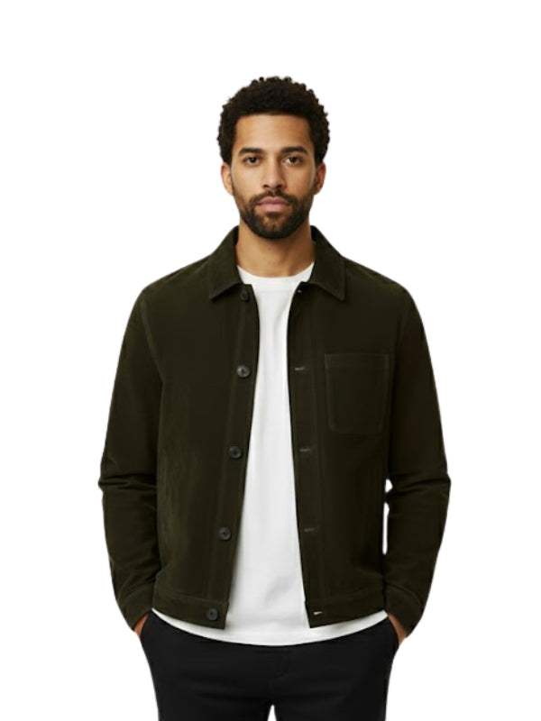 Man wearing a dark green jacket over a white shirt on a white background