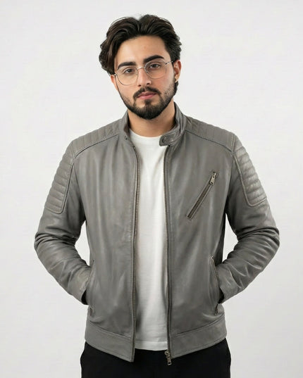 Man wearing a gray leather jacket on a white background