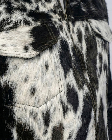 Close-up of a black and white patterned jacket with a zipper.