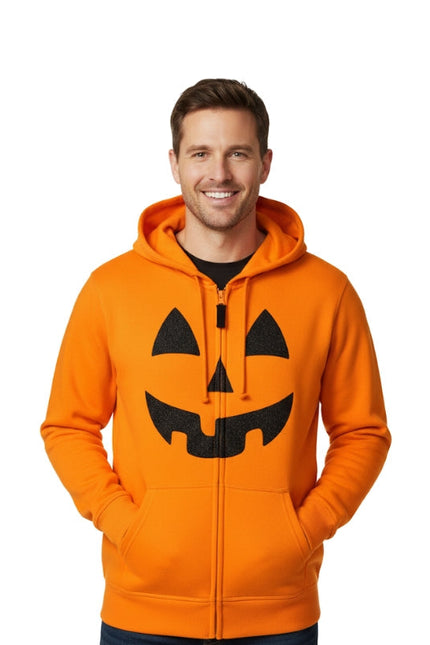 Man wearing an orange hoodie with a pumpkin face design on a white background