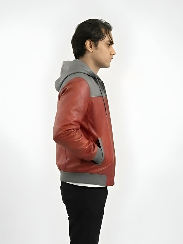 Person wearing a red and gray jacket on a white background