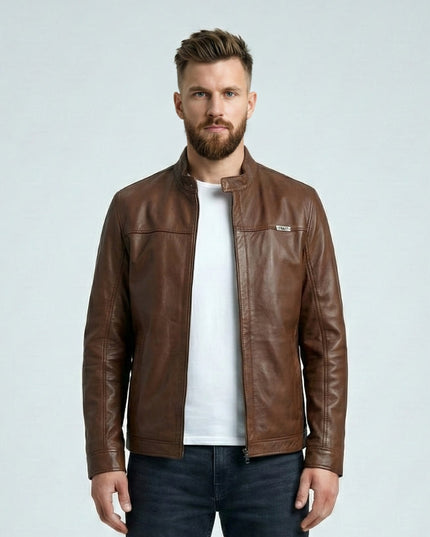 Man wearing a brown leather jacket on a light gray background