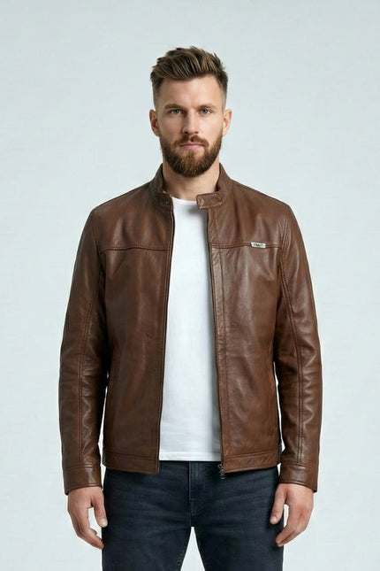 Man wearing a brown leather jacket on a light gray background