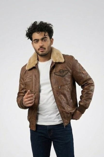 Man wearing a brown leather jacket with fur collar on a white background