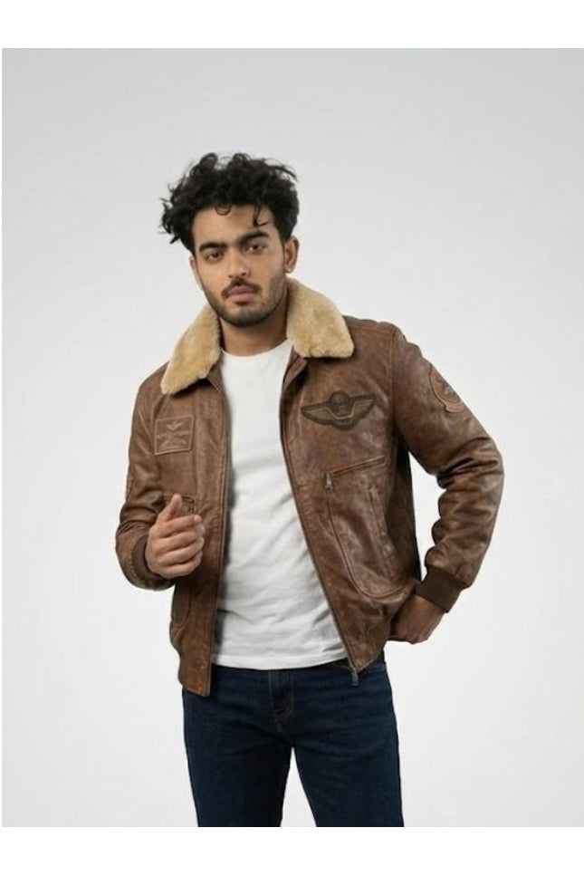 Man wearing a brown leather jacket with fur collar on a white background