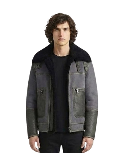 Man wearing a dark gray jacket with black fur collar on a white background