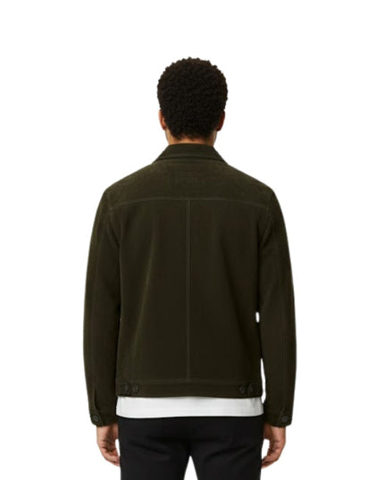Person wearing a dark green jacket on a white background