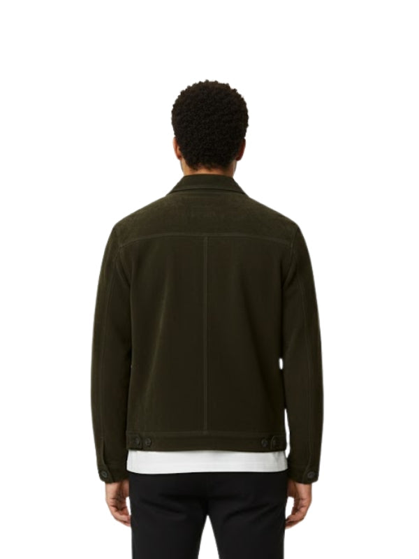 Person wearing a dark green jacket on a white background