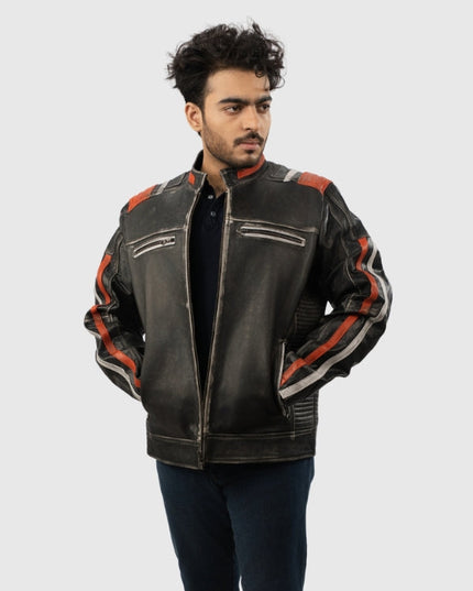 Man wearing a black leather jacket with red accents on a white background