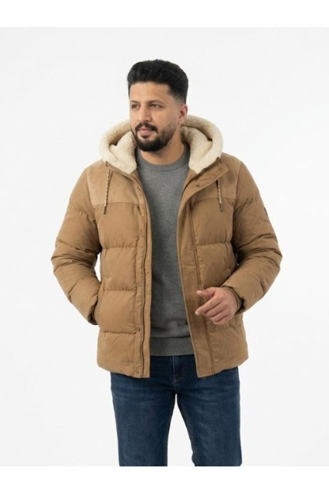 Man wearing a brown puffer jacket with a white hood on a white background