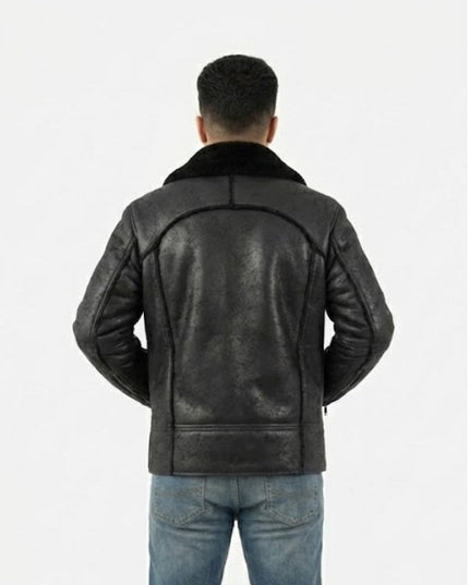 Person wearing a black leather jacket on a white background
