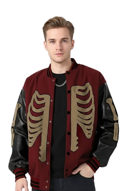 Man wearing a red and black jacket with skeleton designs on a white background