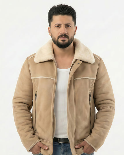 Man wearing a beige shearling jacket on a white background