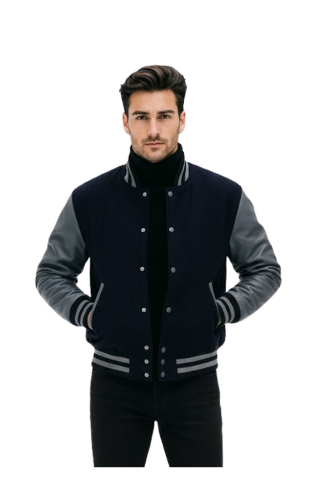 Man wearing a black and gray varsity jacket on a white background