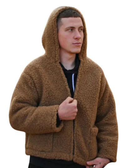 Man wearing a brown hooded jacket on a white background