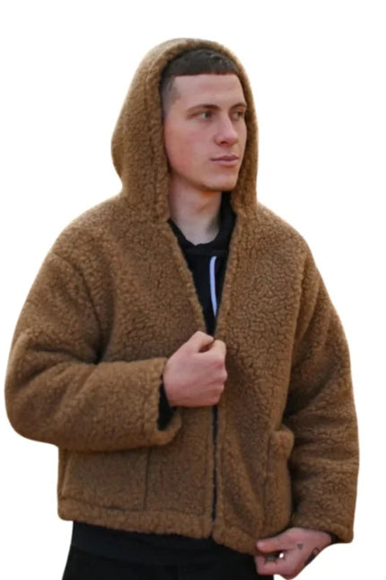 Man wearing a brown hooded jacket on a white background