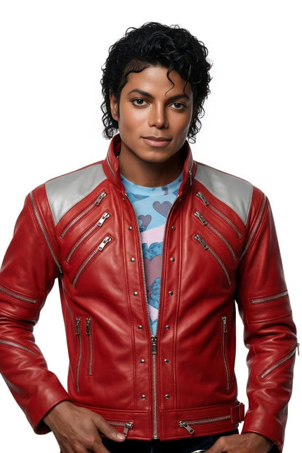 Person wearing a red leather jacket with silver zippers on a white background